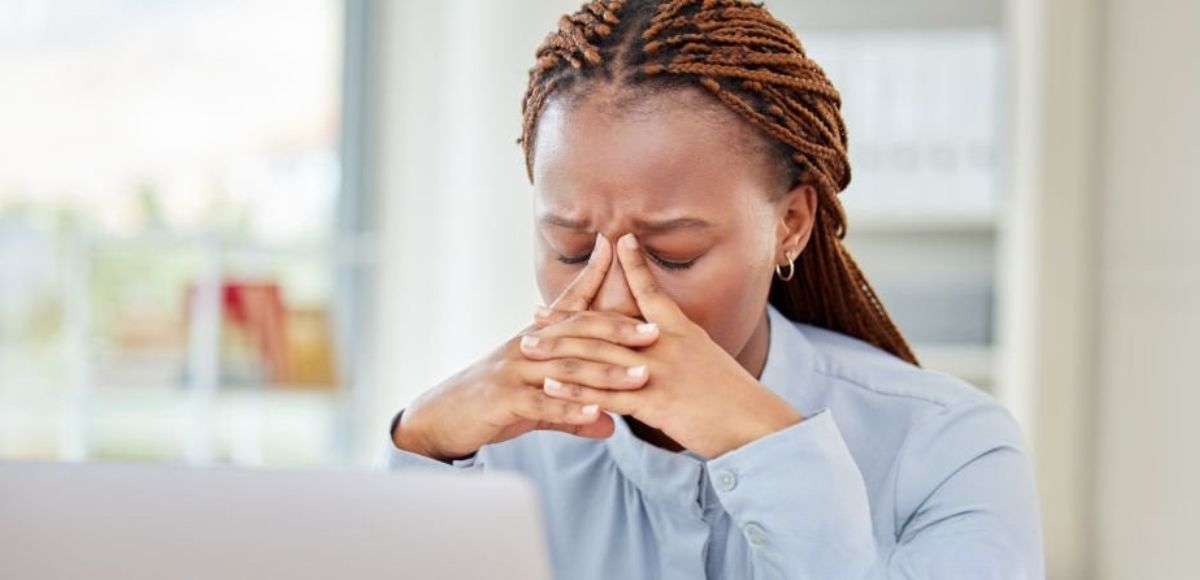 A person at a career crossroads choosing the right path forward